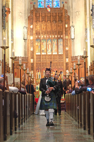 Kim Montgomery Johnson piping the wedding recessional down the aisle at Historic Trinity Lutheran Church in downtown Detroit